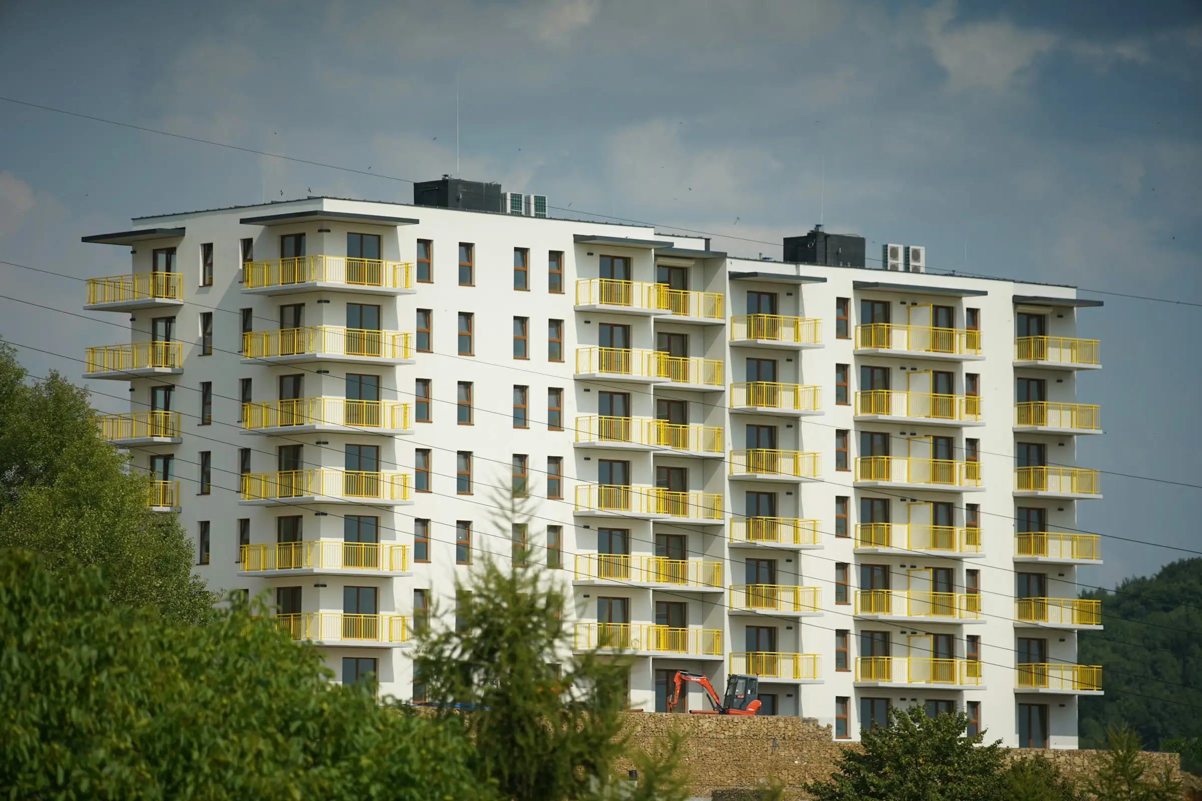 Multi-story apartment building with rows of balconies